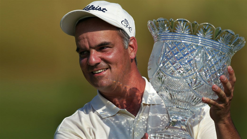 Barry Evans raises the trophy after winning the 2002 PGA Club Professional Championship